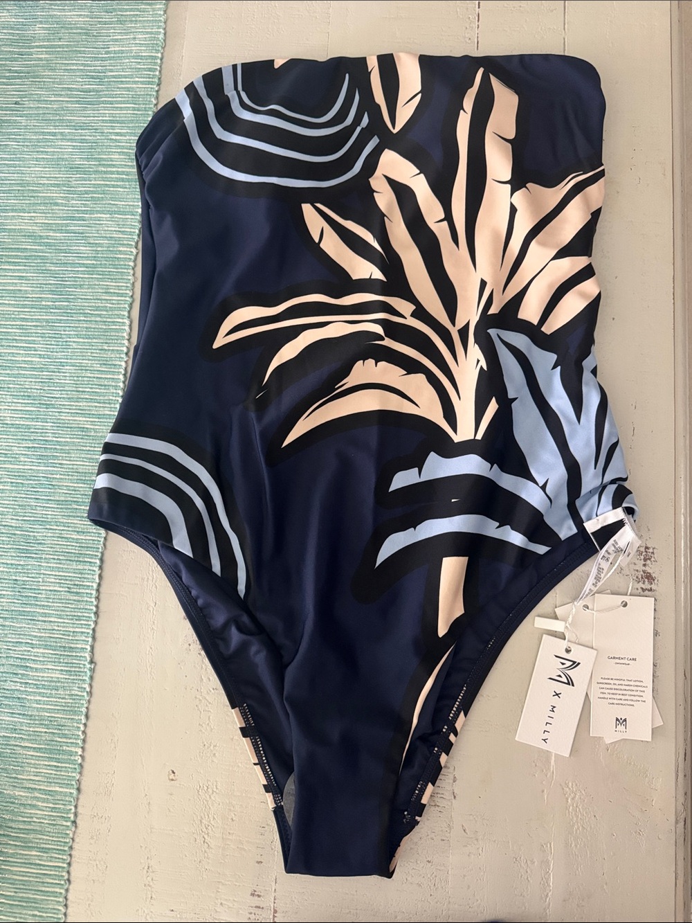 Milly Navy One-Piece Swimsuit with nude and Light Blue Tropical Print